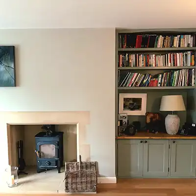 bookcase and fireplace